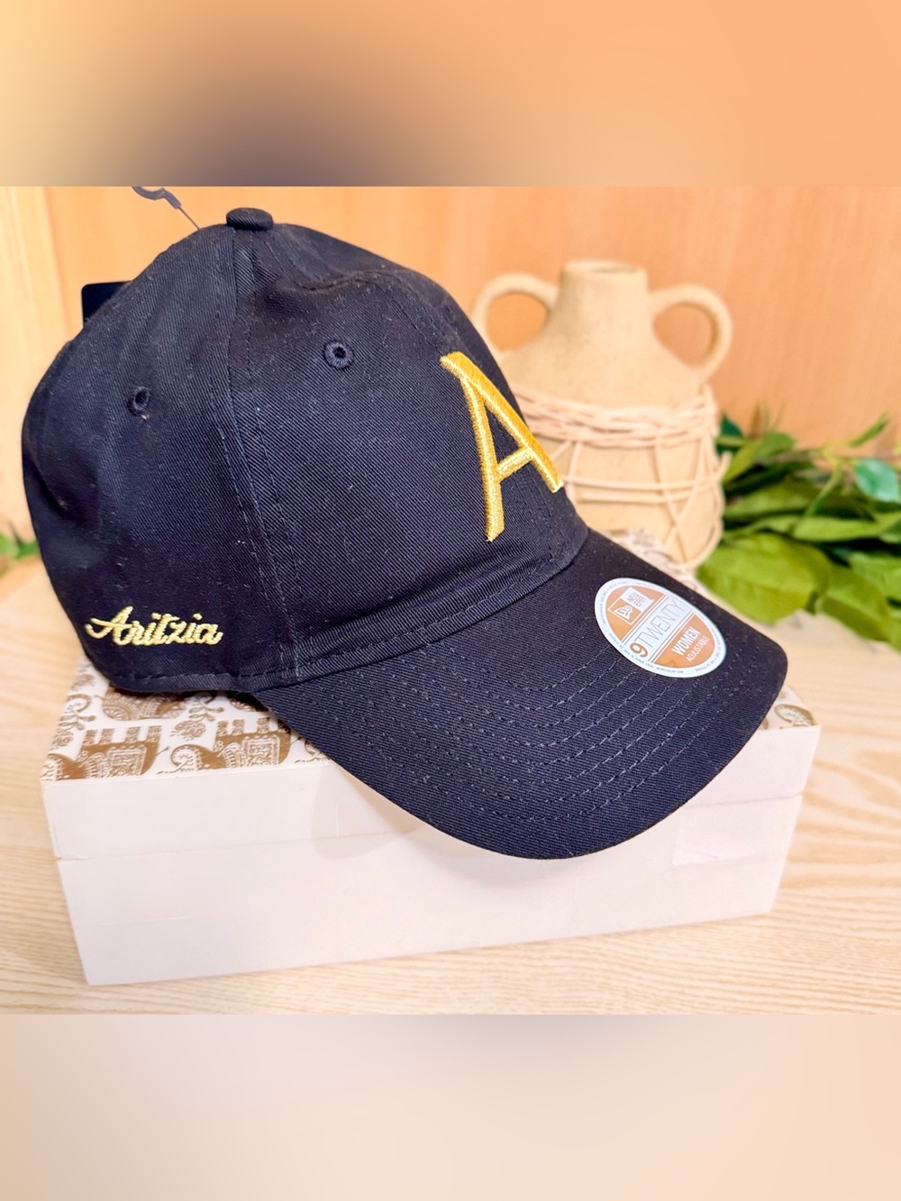 Aritzia Black Baseball Cap with Gold Embroidered A